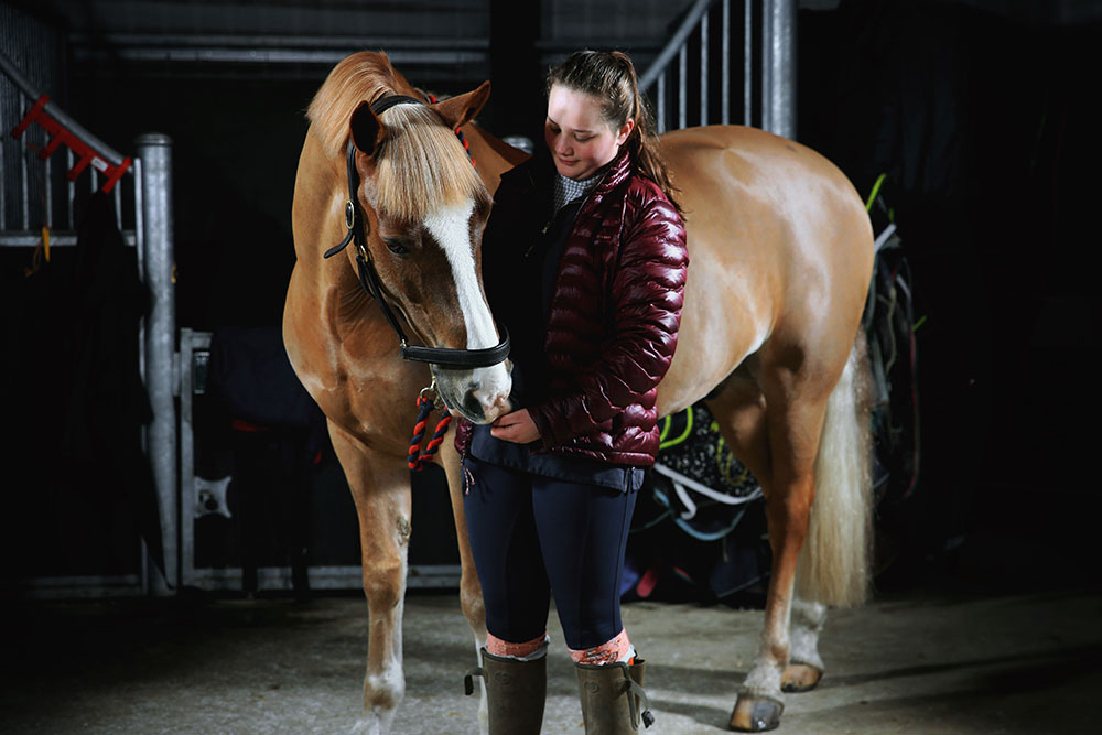 16 Year old Eventer (Ruby) Stood with their Horse